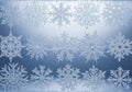 Intricately designed snowflakes are displayed on a blue gradient Royalty Free Stock Photo