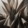 Intricately folded beige fabric forms sharp, elongated peaks and troughs, creating a dynamic, Royalty Free Stock Photo