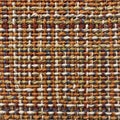 Intricately interwoven textile featuring a dense, colorful pattern. The fabric displays a Royalty Free Stock Photo