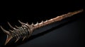 Intricately Textured Spiked Weapon With Long Wooden Handle