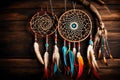 An intricately woven dream catcher displayed against a rustic wooden background, with vibrant colors and delicate patterns