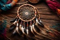 An intricately woven dream catcher displayed against a rustic wooden background, with vibrant colors and delicate patterns