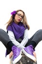 Intriguing teen dressed in purple Royalty Free Stock Photo