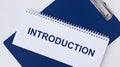 Introduction word inscription on white paper