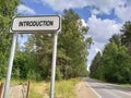 INTRODUCTION is a word on a sign outside the city. Business and financial words in unusual places