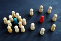 Introvert and extrovert concept. Wooden figurines on a desk