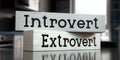 Introvert, extrovert - words on wooden blocks