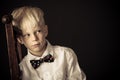 Introvert withdrawn little blond boy Royalty Free Stock Photo