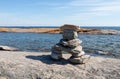 Inuksuk bestie a lake at O`Donnell Point Royalty Free Stock Photo