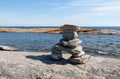 Inuksuk bestie a lake at O`Donnell Point