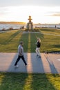 Inukshuk stone sculpture in the sunset time at English Bay Beach, Vancouver City, Canada.