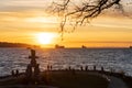 Inukshuk stone sculpture in the sunset time at English Bay Beach, Vancouver City, Canada. Royalty Free Stock Photo