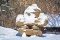 Inukshuk and trees in winter time Montrea Royalty Free Stock Photo