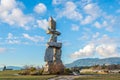 Inukshuk Vancouver with blue clouds sky backgrounds
