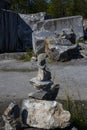 Inuksuk - a stone figure of several stones, an ancient cultural symbol in the forest of Karelia Royalty Free Stock Photo