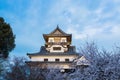 Inuyama castle historic building landmark in spring with beautiful cherry blossom