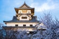 Inuyama castle historic building landmark in spring with beautiful cherry blossom