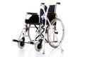 Invalid chair, wheelchair and crutches- Royalty Free Stock Photo