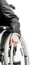 Invalid or disabled businessman in black suit sitting wheelchair Royalty Free Stock Photo