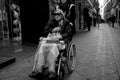 An invalid man going for a walk in Seville. 30