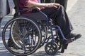 Invalid man sitting on a wheelchair