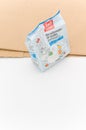 pure sodium bicarbonate in a plastic package and paper bag on white background Royalty Free Stock Photo