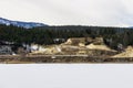 INVERMERE, CANADA - MARCH 17, 2020: frozen Windermere lake and rocky mountains in british columbia canada