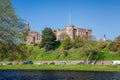 Inverness Castle over the River Ness against blue sky in Scotland, United Kingdom of Great Britain and Northern Ireland