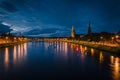 Inverness city landscape at night with the lights reflected in the river Ness, Scotland, United Kingdom Royalty Free Stock Photo