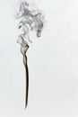 Inverted Black smoke figure on white background Royalty Free Stock Photo