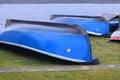 Inverted boats dry on the shore. Royalty Free Stock Photo