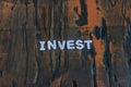 Invest written in white lettering Royalty Free Stock Photo
