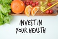 Invest in your health , Healthy lifestyle concept with diet and fitness , Get fit in  , fitness equipment and healthy food Royalty Free Stock Photo