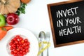 Invest in your health , Healthy lifestyle concept with diet and fitness , Get fit in , fitness equipment and healthy food