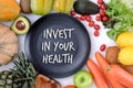 Invest in your health , Healthy lifestyle concept with diet and fitness , Get fit in  , fitness equipment and healthy food Royalty Free Stock Photo