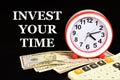 Invest your time. Text inscription on the background of a watch and cash. Royalty Free Stock Photo