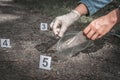 Investigator collects evidence - crime scene investigation Royalty Free Stock Photo