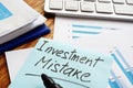 Investment Mistake written on financial documents Royalty Free Stock Photo