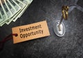 Investment Opportunity tag with cash, gold key and lock Royalty Free Stock Photo