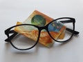 investment and promotion for a better vision, swiss banknote of ten francs and black plastic frame glasses