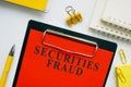 Investment or Securities fraud report on red form.