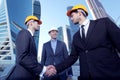 Investor and contractor shaking hands Royalty Free Stock Photo