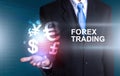 Investor holding world of currency forex trading