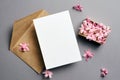 Invitation or greeting card mockup with envelope and hyacinth flowers on grey background Royalty Free Stock Photo