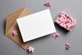 Invitation or greeting card mockup with envelope and hyacinth flowers on grey background Royalty Free Stock Photo