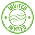 INVITED text written on green round postal stamp sign