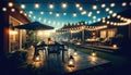 Cozy Backyard Evening with String Lights and Dining Setup, AI Generated