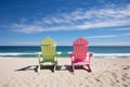 Inviting beach house scene with colorful beach chairs Royalty Free Stock Photo