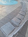 Chairs lined up at a downtown fountain