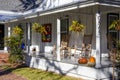 An inviting front porch of a renovated wood-frame house in historic White Springs, Florida Royalty Free Stock Photo